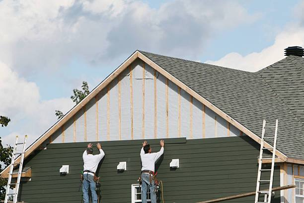 Professional Siding Contractor technician working in Guilford, IN